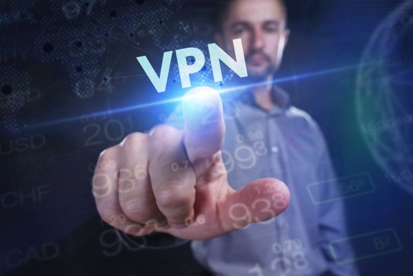 vpn services comparison protonvpn nordvpn man touching vpn light 